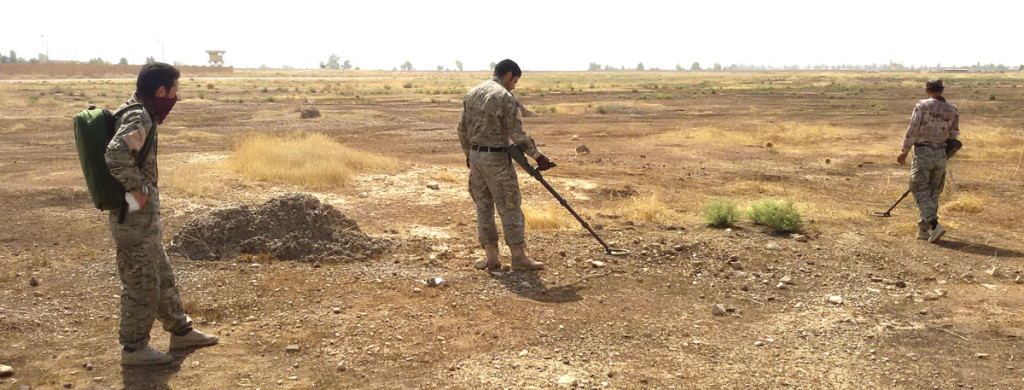 Kurdish Peshmerga soldier with a metal detector provided by Spirit of America