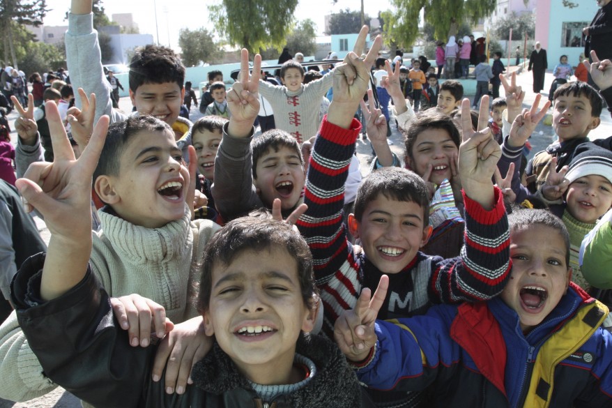 Reuters_Syria_Refugees_Jordan_01dec11-878x585