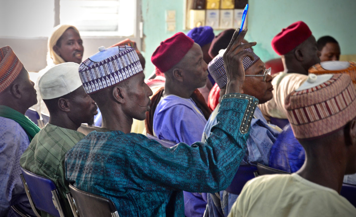 A village representative volunteers to speak and offer his insights during the community-level breakout sessions to develop a new grassroots counter-Boko Haram strategy