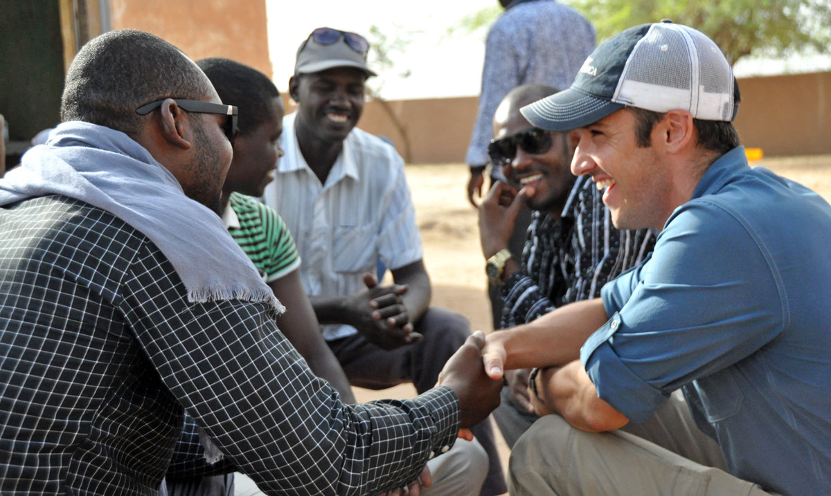 Chris chats with SoA supported graduates during a recent visit to Ingall, Niger