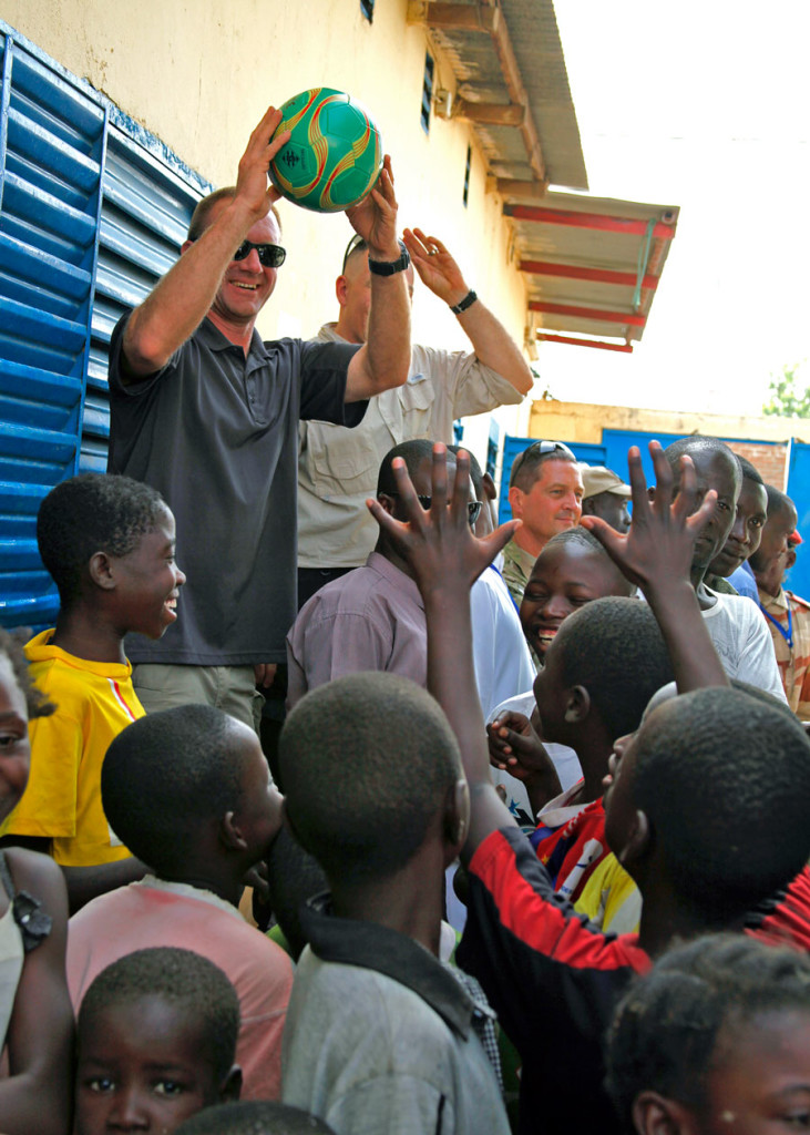 U.S. officials passed out SoA-provided soccer balls to the children