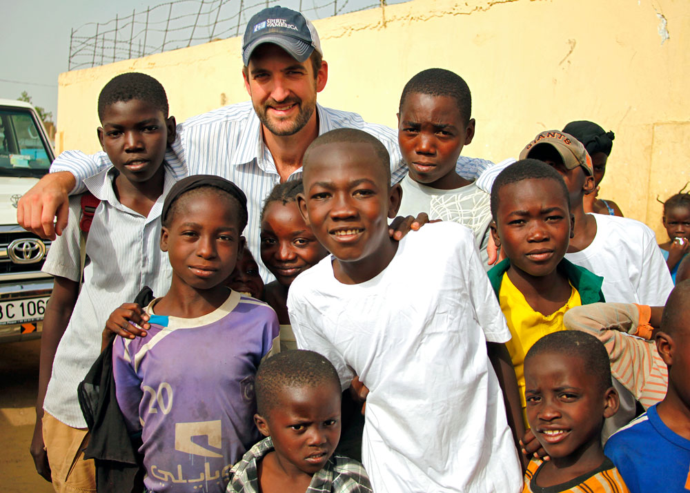 SoA representative, Isaac Eagan, with young residents of the orphanage