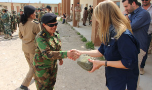 Female Peshmerga receiving IFAK
