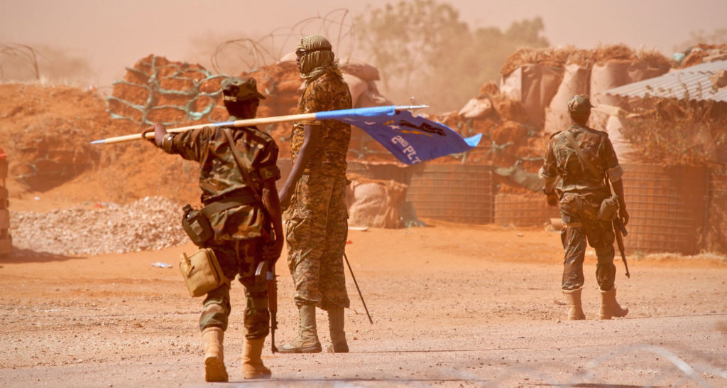 As a dust storm rolls in, Danab soldiers return to their base after patrolling in the Somalia’s Lower Shebelle Region