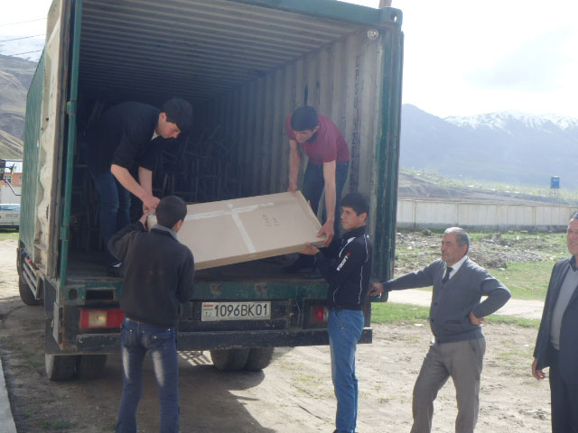 SoA-funded student desks being delivered to the newly built Gharm District school