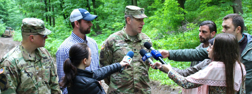 Spirit of America’s Chris Clary and Lt. Col. Bilbo, then US Defense Attaché in Moldova, conduct an interview to discuss how the US and Moldovan engineer units had worked together to benefit the community while meeting training objectives.